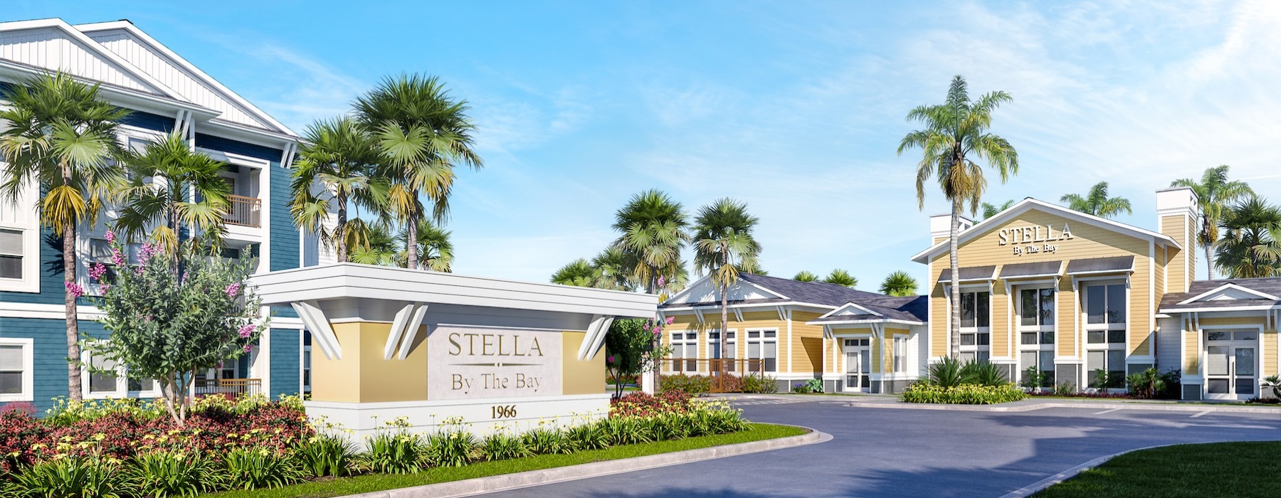 buildings with a sign and trees